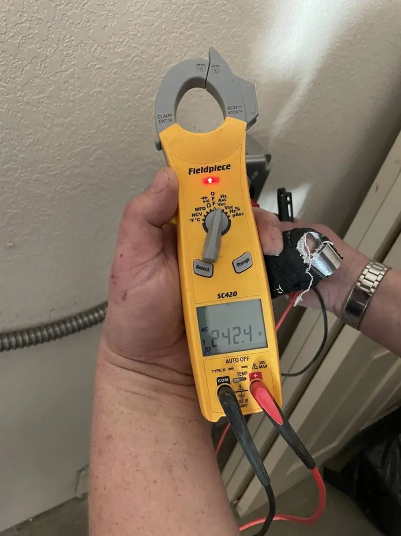 Voltage testing with clamp meter during Aluminum Wiring Replacement in Danby